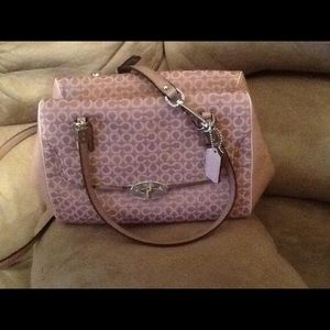Brand new Coach pink purse.